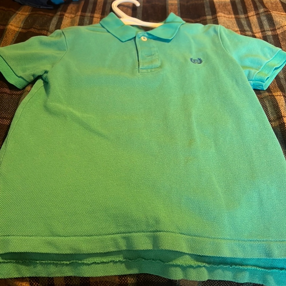 A green boys polo shirt
